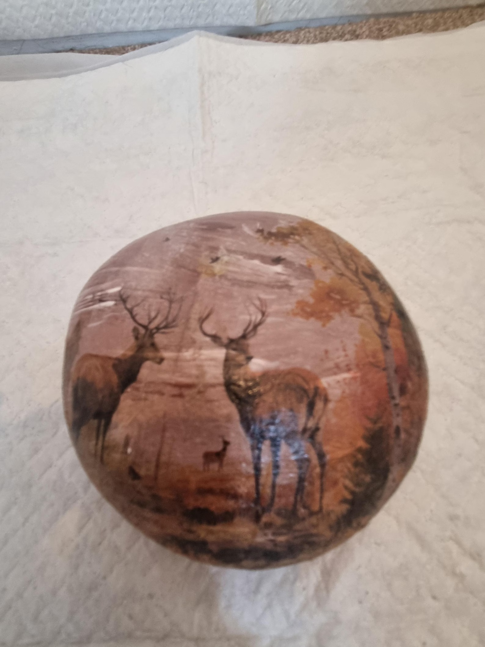 Brown woodland deer doorstop rock front